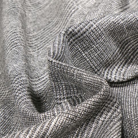 Tissu Jacquard polyviscose extensible Manchester pailleté sur fond Argent