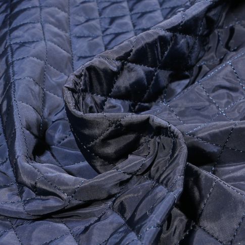Tissu Doudoune matelassé Dahli sur fond Bleu marine