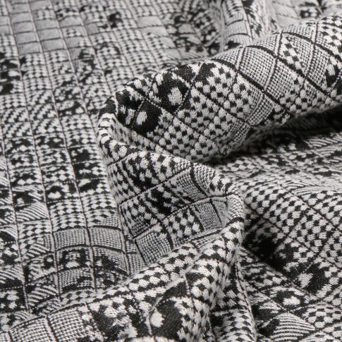 Tissu Jacquard matelassé Deva sur fond Noir