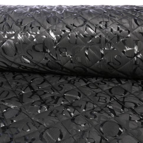 Tissu Doudoune matelassé Lettres sur fond Noir