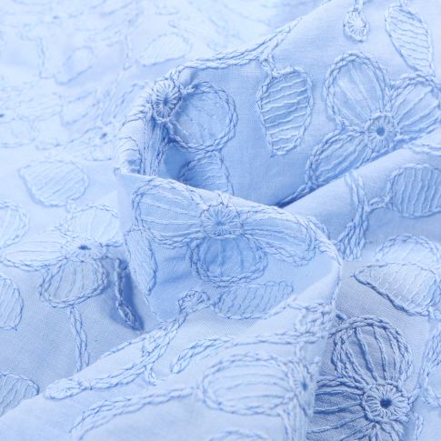 Tissu Coton brodé  Lolli sur fond Bleu