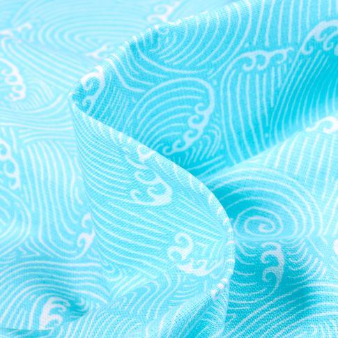 Tissu Coton imprimé Arty Vagues stylisées sur fond Bleu turquoise