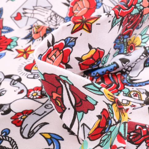 Tissu Coton imprimé Arty Tatoo sur fond Blanc