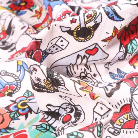 Tissu Coton enduit Tattoo sur fond Blanc