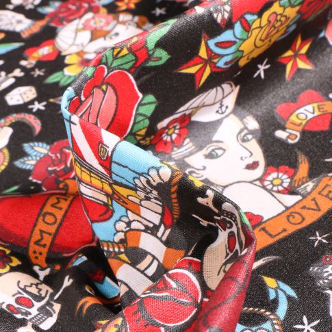 Tissu Coton enduit Tattoo sur fond Noir