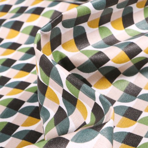 Tissu Coton enduit Seventies vert sur fond Blanc
