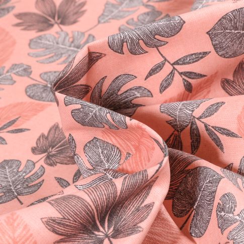 Tissu Coton enduit Sun leaves sur fond Rose