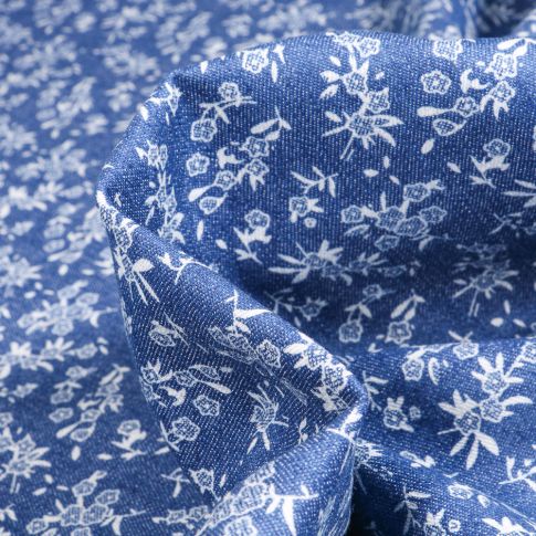 Tissu Jean Denim extensible Bouquets de fleurs blanches sur fond Bleu
