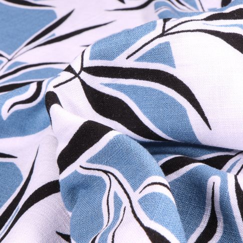 Tissu Viscose extensible Feuilles de bambou sur fond Bleu ciel