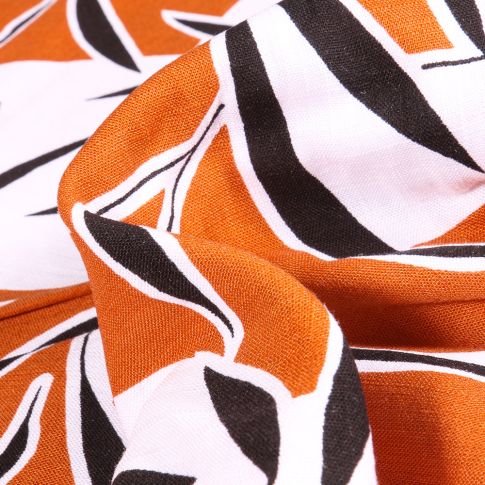 Tissu Viscose extensible Feuilles de bambou sur fond Orange