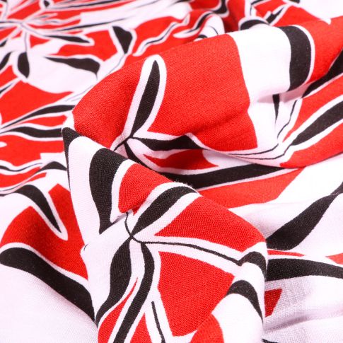 Tissu Viscose extensible Feuilles de bambou sur fond Rouge