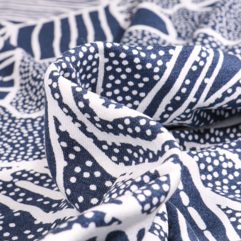 Tissu Jersey Viscose  Motifs abstraits pointillés sur fond Bleu