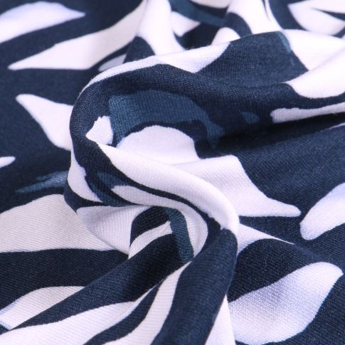 Tissu Jersey Viscose Vortex Motifs abstraits blanc sur fond Bleu marine