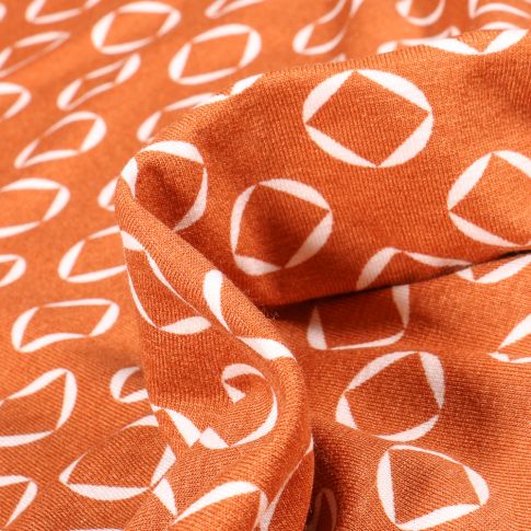 Tissu Jersey Viscose  Carré dans cercles sur fond Orange