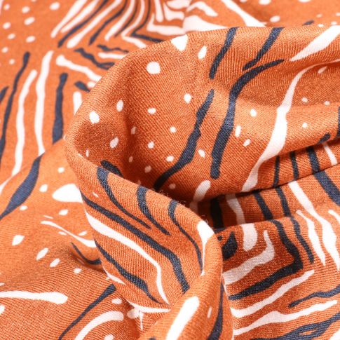 Tissu Jersey Viscose  Traits et pois sur fond Orange
