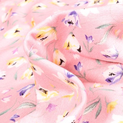 Tissu Jersey Viscose  Tess sur fond Rose pâle