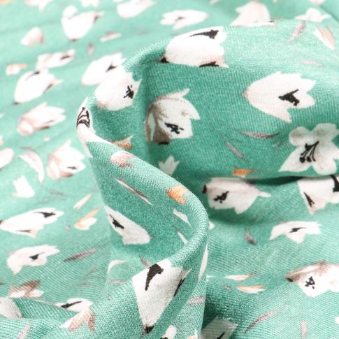 Tissu Jersey Viscose  Tess sur fond Vert menthe