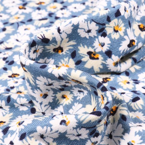 Tissu Jersey Viscose  Fleurs et pâquerettes sur fond Bleu ciel