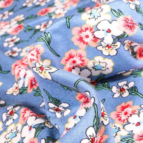 Tissu Jersey Viscose  Bouquets de fleurs colorés sur fond Bleu ciel