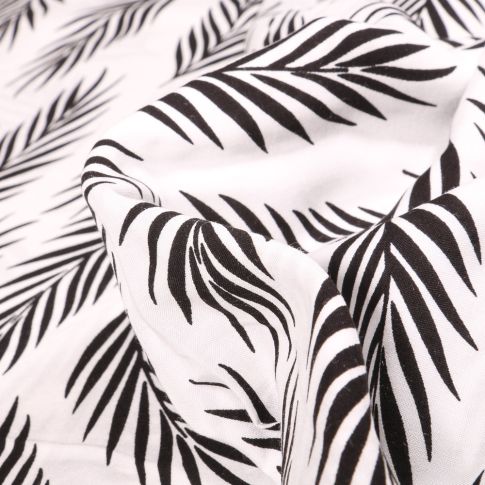 Tissu Viscose Popeline Feuilles de palme noires sur fond Blanc