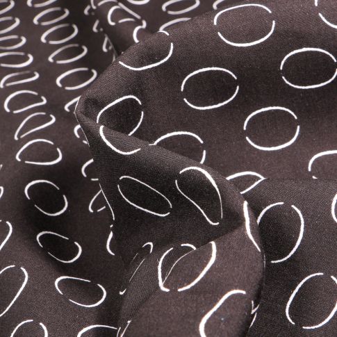 Tissu Viscose Popeline Anneaux sur fond Noir