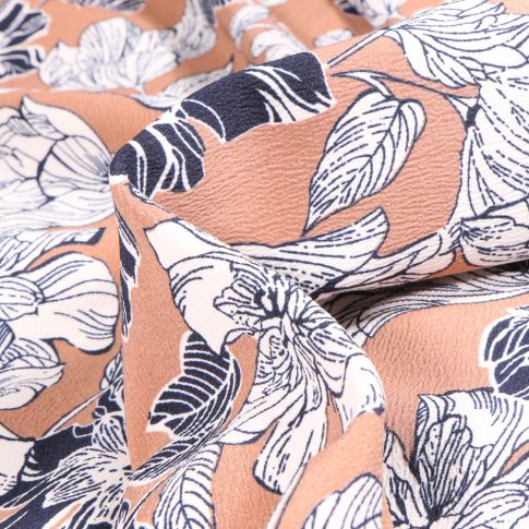 Tissu Crêpe Mix Flowers sur fond Rose nude