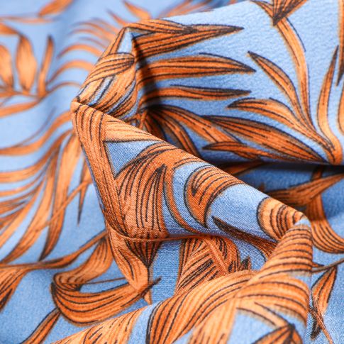 Tissu Crêpe Carmen sur fond Bleu ciel