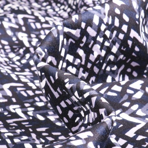 Tissu Coton satiné extensible Zig zag sur fond Bleu marine