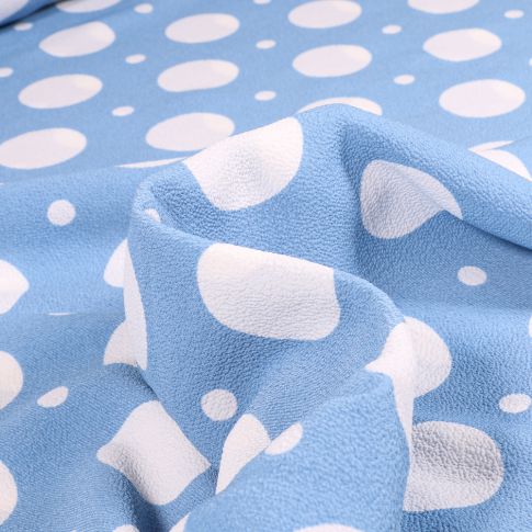 Tissu Crêpe Bubble sur fond Bleu ciel