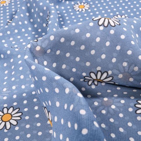 Tissu Mousseline Marguerites sur fond Bleu ciel
