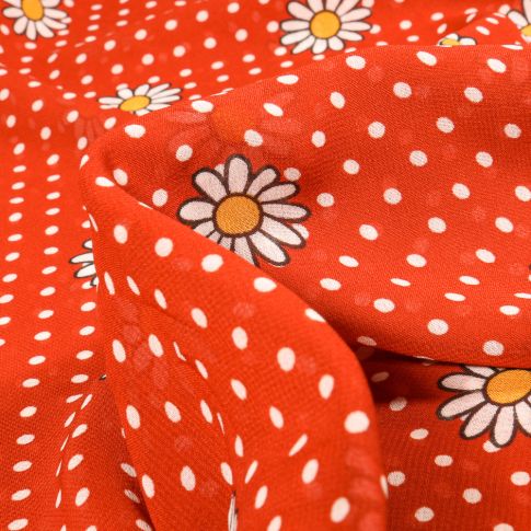 Tissu Mousseline Marguerites sur fond Orange