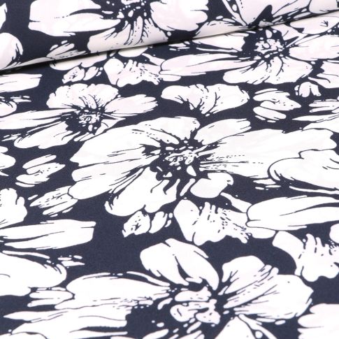 Tissu Crêpe Georgette Fleurs blanches sur fond Bleu marine