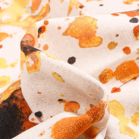 Tissu Viscose Lin Taches de peinture orangé sur fond Ecru