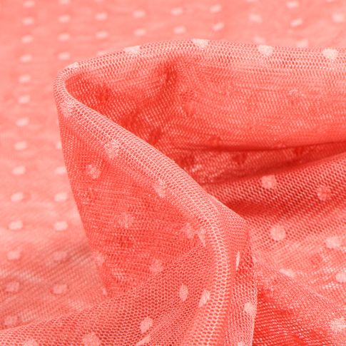 Tissu Tulle souple  pois 5 mm sur fond Corail