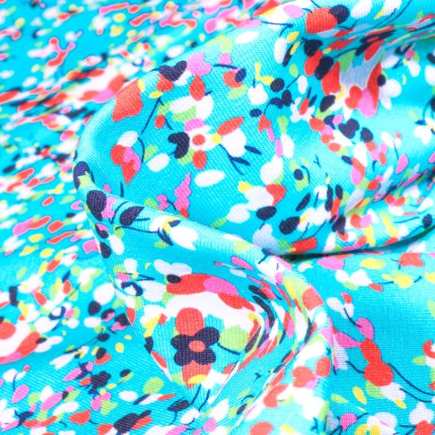 Tissu Jersey coton Helena Confettis multicolores sur fond Bleu turquoise