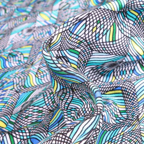 Tissu Jersey coton Formes psychédéliques sur fond Bleu turquoise