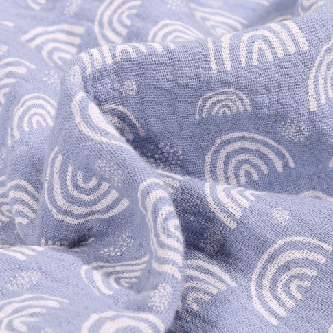Tissu Double gaze imprimé Arc en ciel sur fond Bleu ciel