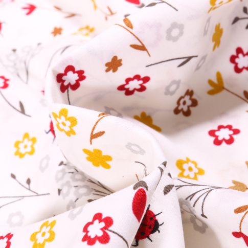 Tissu Coton imprimé Ladybug Coccinelle et fleurs sur fond Blanc
