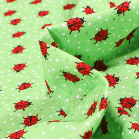 Tissu Coton imprimé LittleBird Coccinelle et petits pois sur fond Vert