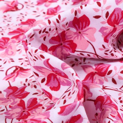 Tissu Coton imprimé LittleBird Camaïeu de Fleurs rose sur fond Blanc
