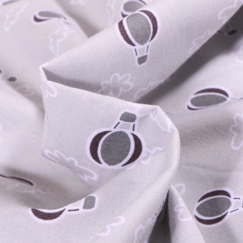 Tissu Coton imprimé Montgolfière et nuages sur fond Gris