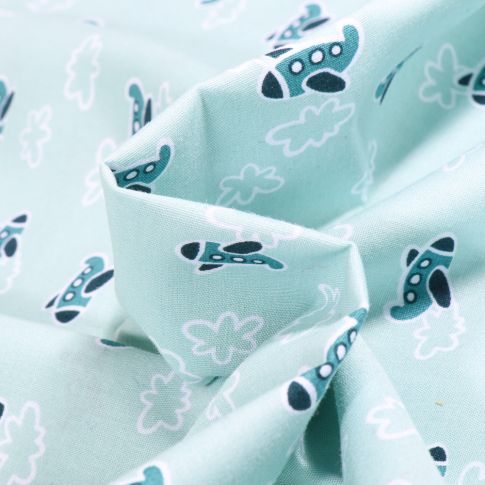 Tissu Coton imprimé LittleBird Avions et nuages sur fond Vert menthe clair