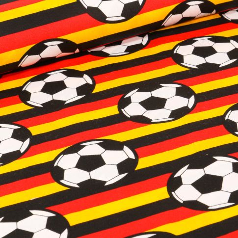 Tissu Coton imprimé Ballons de foot et rayures jaunes et rouges sur fond Noir