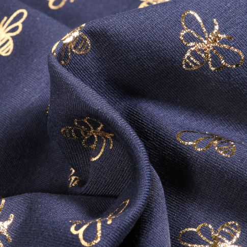 Tissu Jersey Coton Abeilles métallisées dorées sur fond Bleu marine
