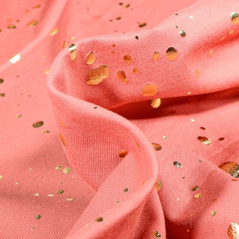 Tissu Jersey Coton Pois métallisés dorés sur fond Rose saumon