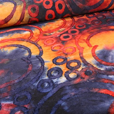 Tissu Jersey Batik Cercles texturés sur fond Orange