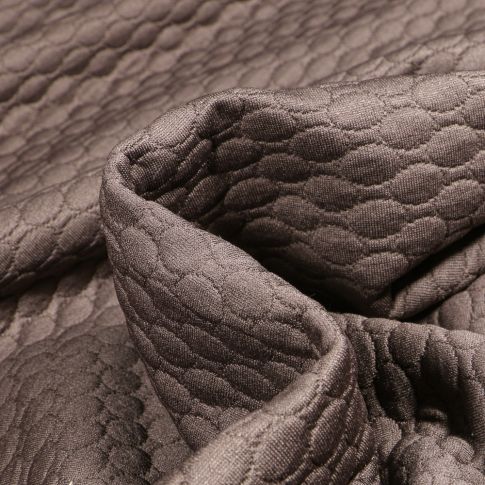 Tissu Sweat matelassé Alvéoles ovales sur fond Gris anthracite
