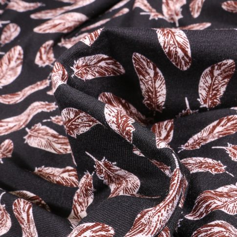 Tissu Jersey Viscose  Plumes sur fond Noir