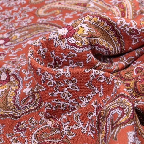 Tissu Jersey Viscose  Motifs cachemire colorés sur fond Brique