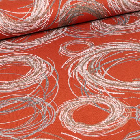 Tissu Jersey Viscose  Tourbillons sur fond Brique